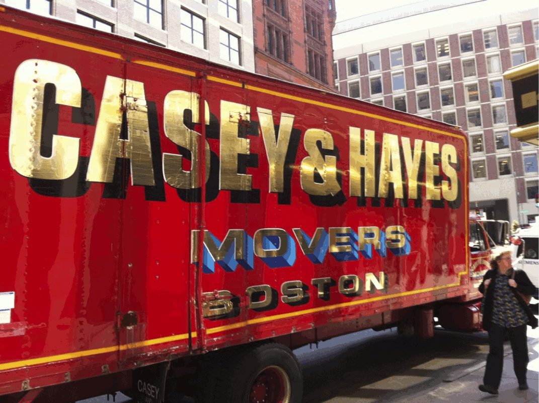 Side of a truck reading 'CASEY & HAYES, MOVERS BOSTON'